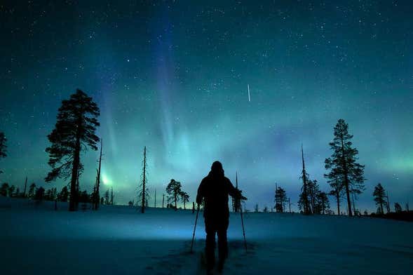 Tour da aurora boreal com raquetes de neve