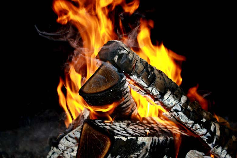 Campfire under the night sky