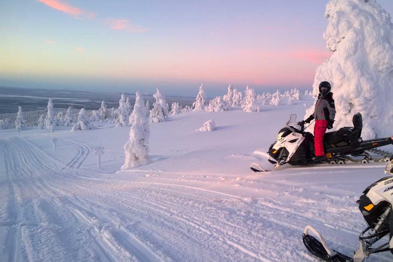 Driving snowmobiles around Rovaniemi