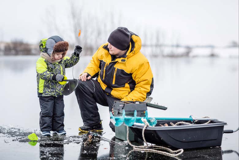 Father and son fishing together
