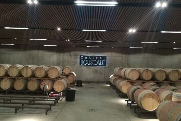 Visit the barrel room of the wineries