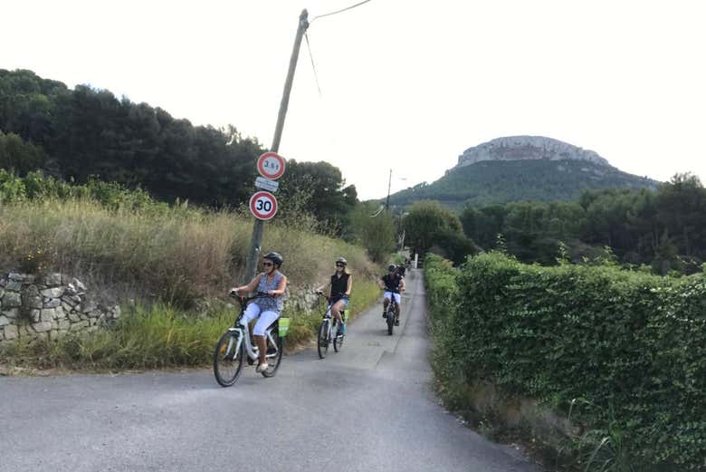 Cycle down paved and dusty paths