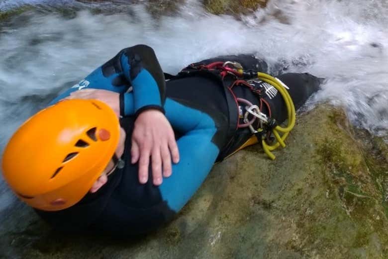 Sliding down natural water slides