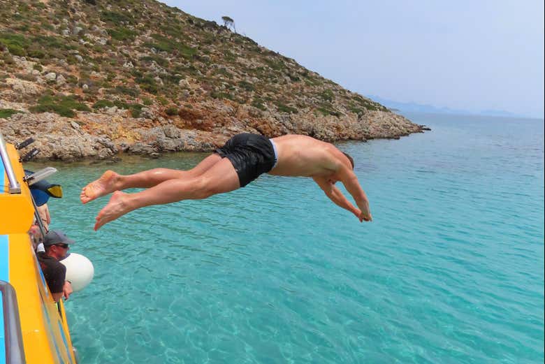 Jump into the waters in Pserimo Island