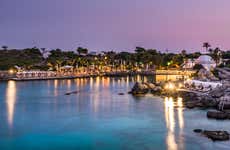 Giro in catamarano al tramonto con cena