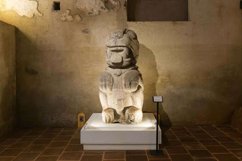 A stone sculpture in the MUNAG