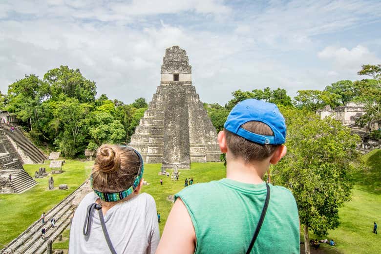 Visitors admiring a Mayan temple