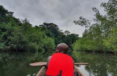 Paseo en canoa por el río Utonde + Visita a una granja tradicional