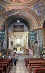 Foto {1} di {2}
