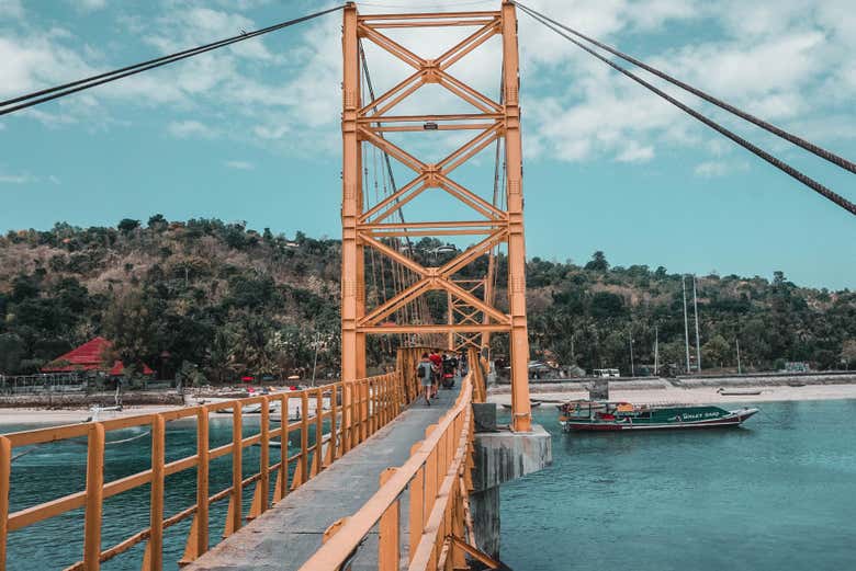 Cross the bridge that connects the two islands
