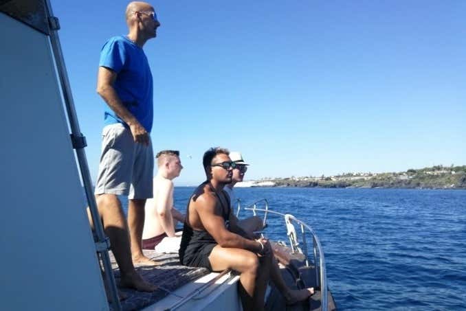 Profiter de la balade en bateau à Aci Castello