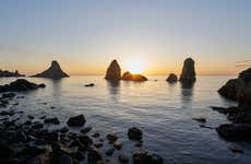 Paseo en barco al atardecer por Aci Trezza + Cena
