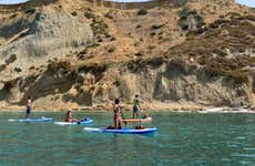 Paddle surf em Cala Manbrù
