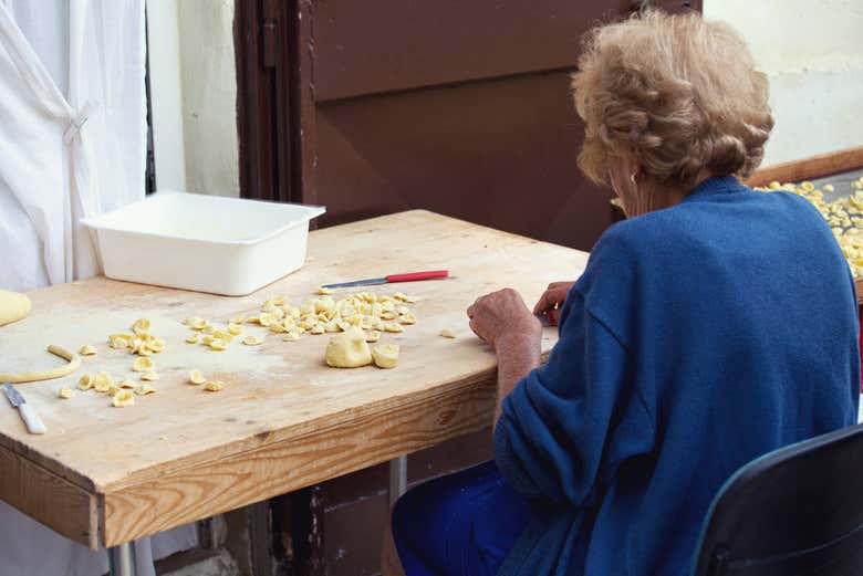 See how the locals make pasta in the streets of Bari