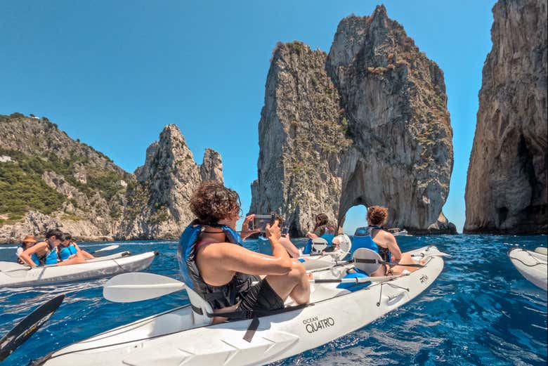 Marvel at the Faraglioni Rocks