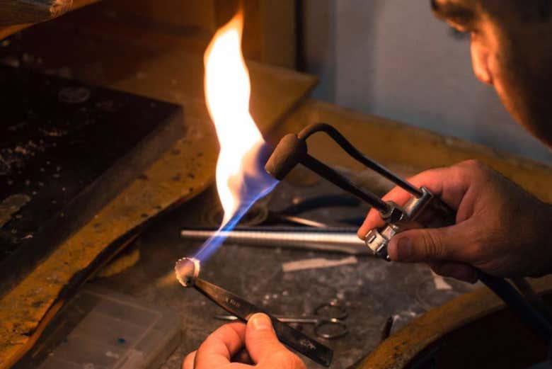 See how fire is used to manipulate the metal