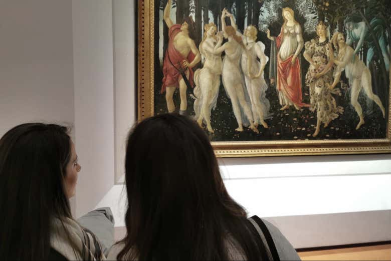 Admirando la "Alegoría de la primavera" de Botticelli