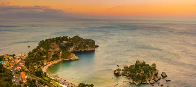 Paseo en barco por la costa de Taormina al atardecer