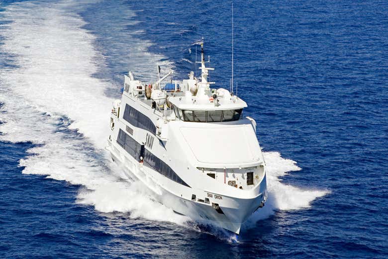 The SNAV high-speed ferry sailing powerfully through the deep bl