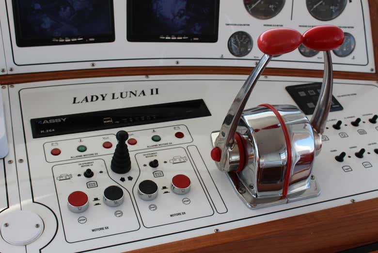 Look at the boat's controls