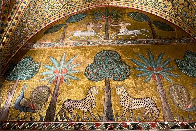 Admire the impressive mosaics in the Palatine Chapel