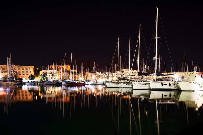 Admire Palermo's Port at night