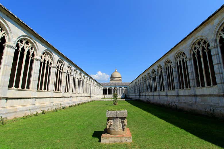 Marvel at the elegant galleries of the Camposanto Monumentale