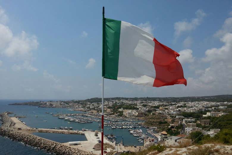Italian flag waving over the port of Leuca