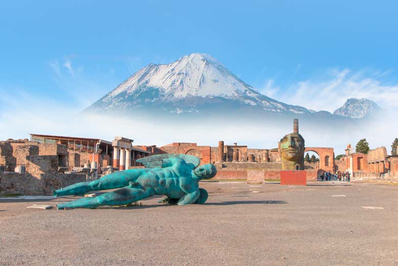 Snow-capped Vesuvius in the background