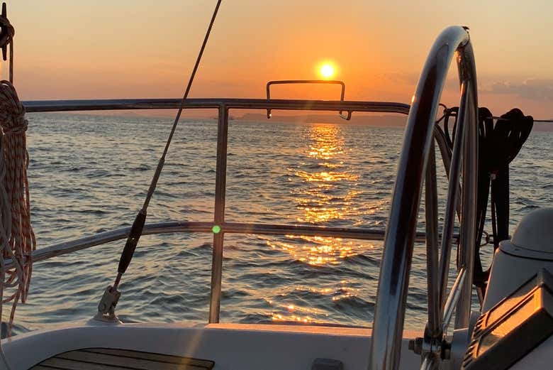 Admire the sun setting over the water