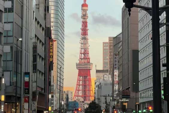 Photograph the iconic red Tokyo Skytree from the city streets