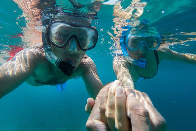 A couple snorkeling