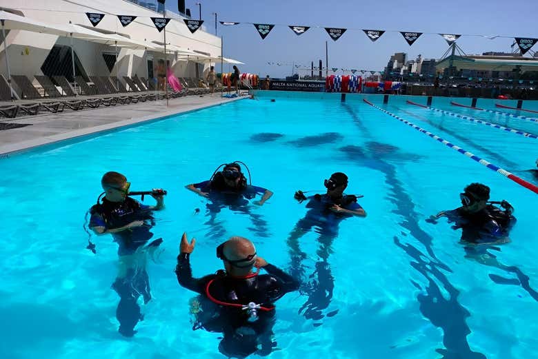 Practice scuba diving before we dive into the sea