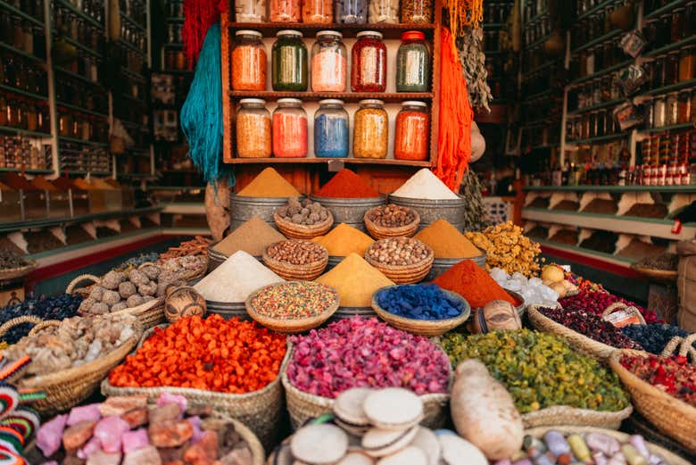 Explore the colorful spice stalls of the Medina's souks
