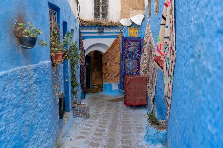 Fachadas de las casas decoradas con alfombras 