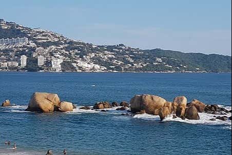 Paddleboarding in Acapulco Bay