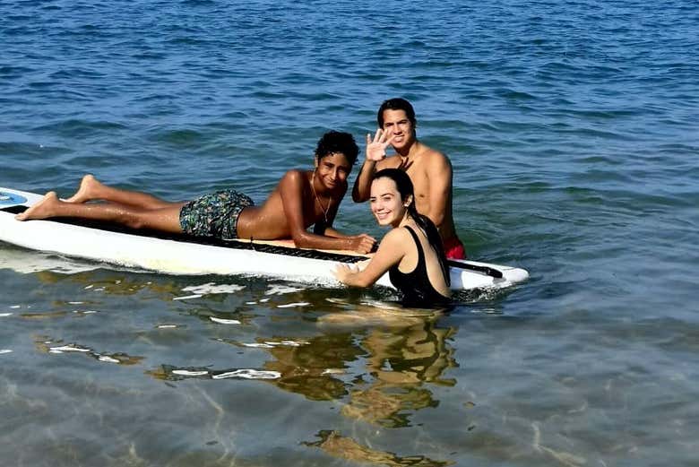 Paddleboarding with a dog in Acapulco