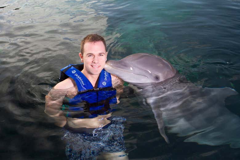 A dolphin kiss on the cheek