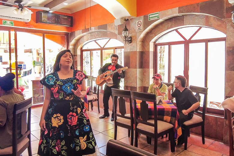 Listen to songs sung by authentic mariachis