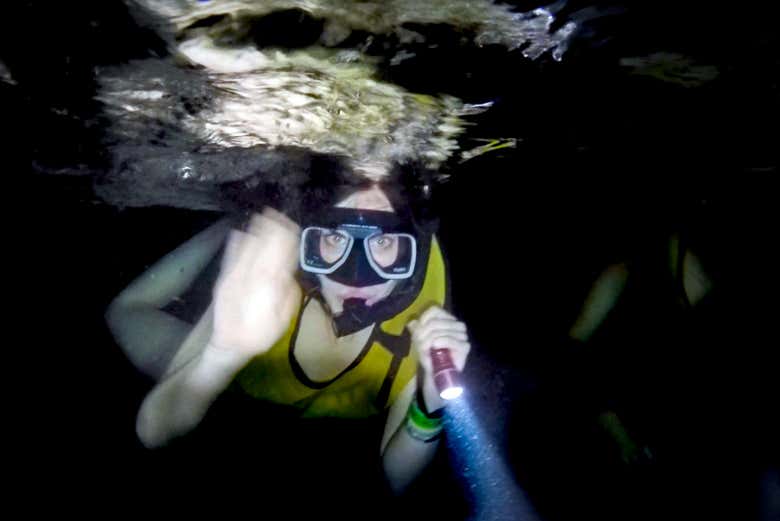 Exploring Cancun's deep waters with a torch