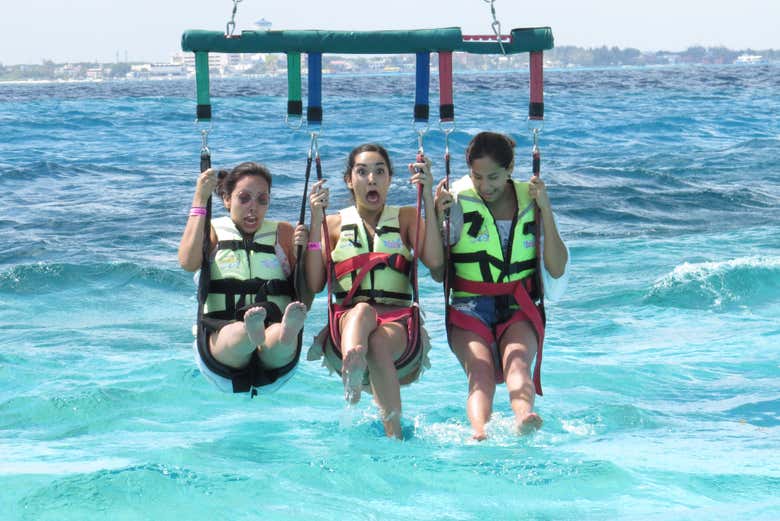 Enjoy this experience on a triple parasail 