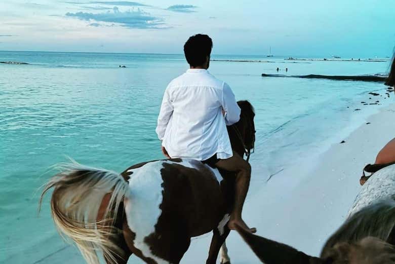 Take in the breathtaking sunset over the Caribbean