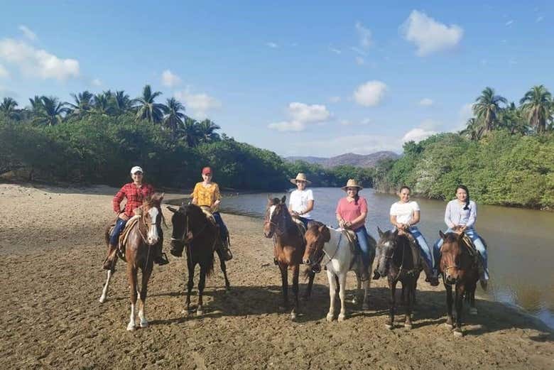 Taking a photo on Larga Beach