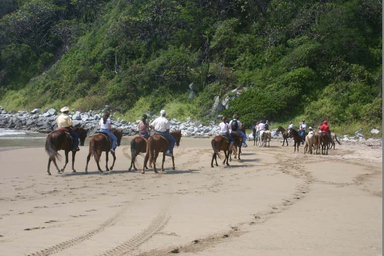 Cabalgando por la playa