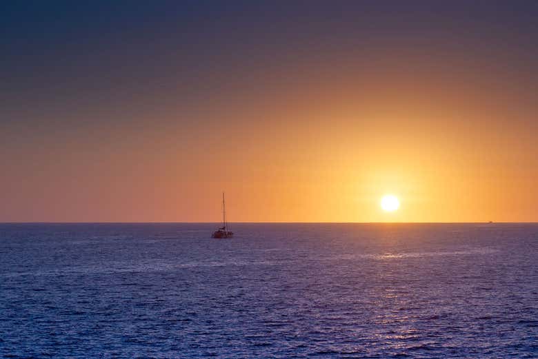 Sailing around Los Cabos at sunset