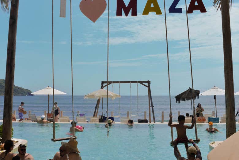 Check out a pool with swings