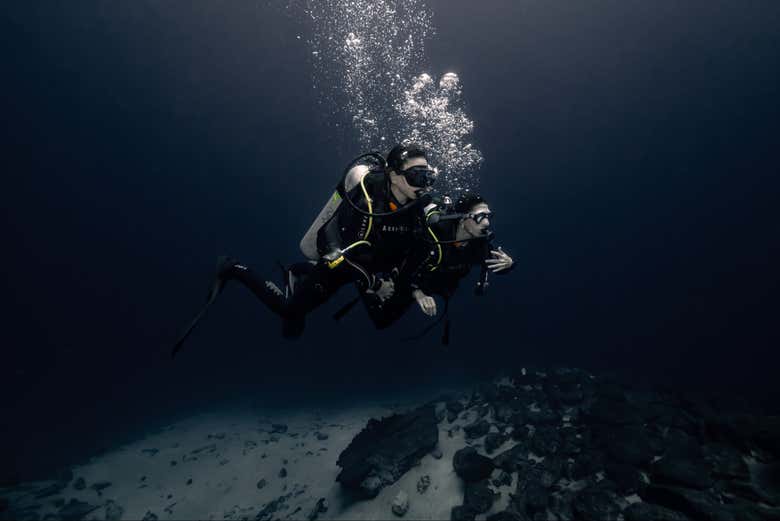 Diving in a dark cenote