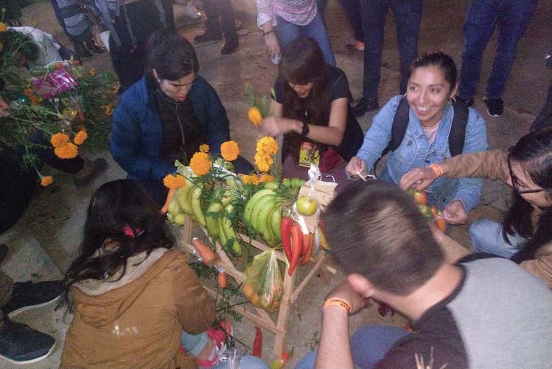 Preparing an offering for Day of the Dead