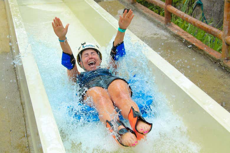 Gliding down a water slide