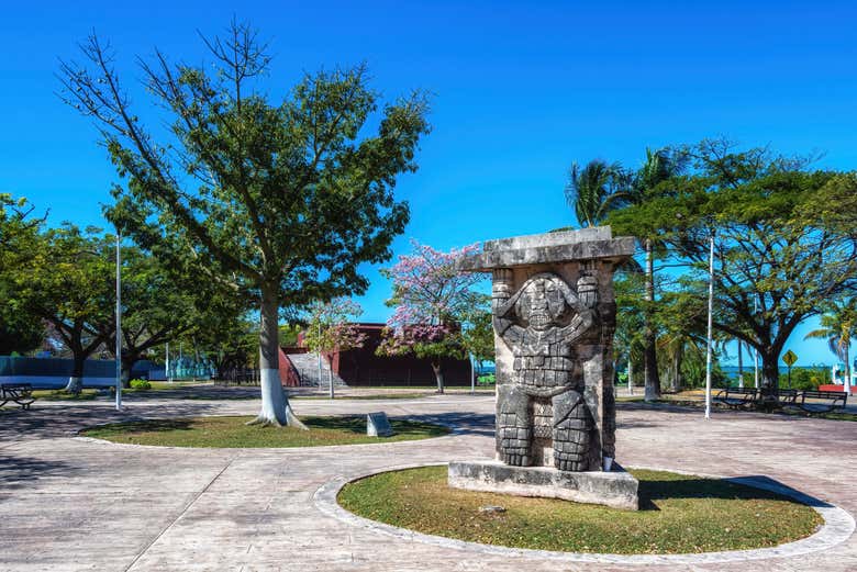 Admire a Mayan statue at Champotón